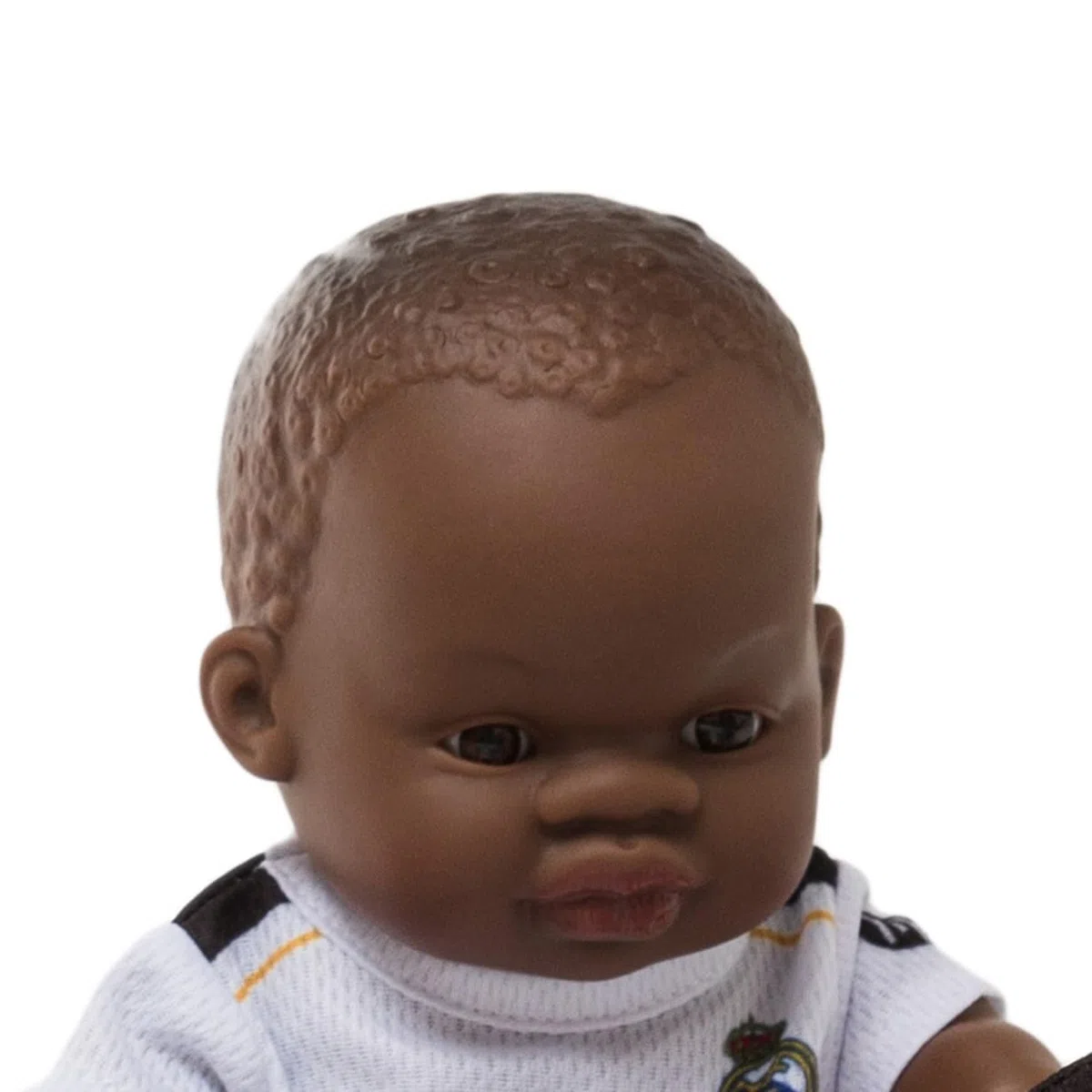 Miniland Real Madrid Muñeco 21 cm con Equipación Oficial Blanca, Muñeco Madrid Fútbol Articulado y Coleccionable, Licencia Oficial | Niño Africano